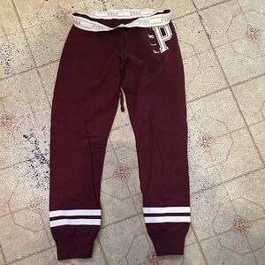 PINK Victoria's Secret Burgundy womans skinny joggers Sweatpants size Medium.